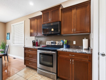 1064 Cordero Cres - kitchen cabinetry and range