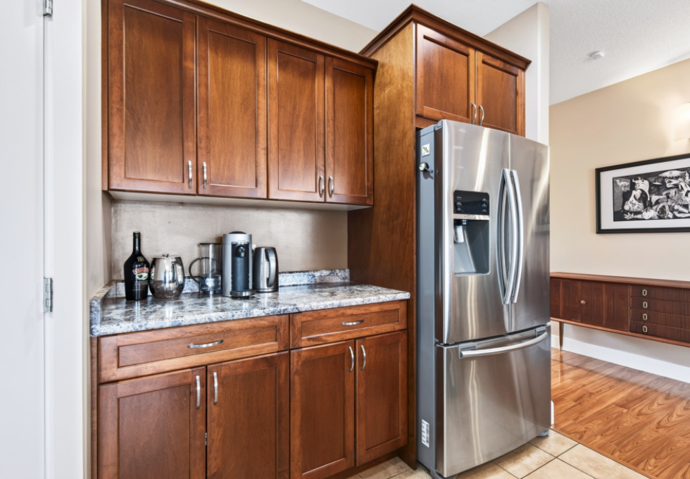 1064 Cordero Cres - kitchen cabinetry and fridge